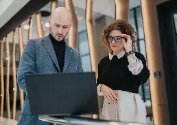 2 people discussing