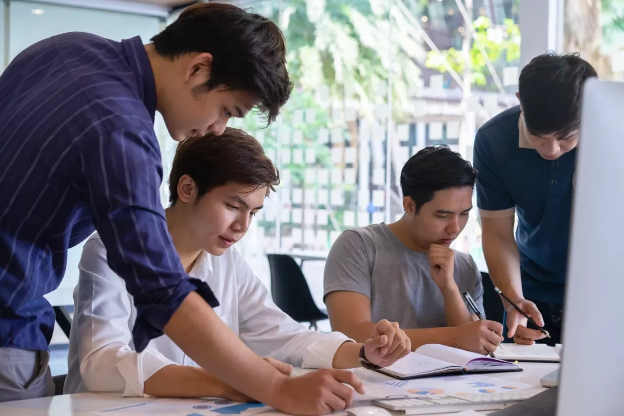 group of people working tgether